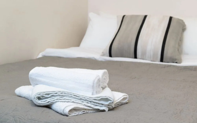 Elegant Duplex with XL Patio by FeelHome