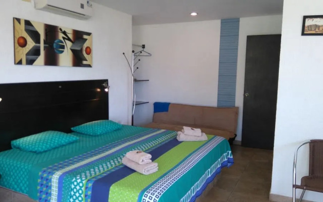 ApartaHotel El Oasis
