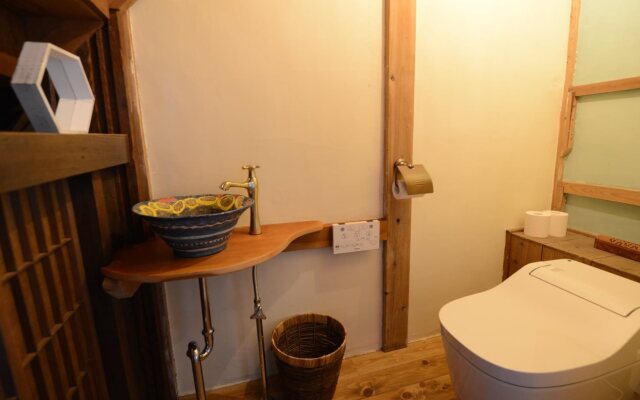 Taketa station hostel cue