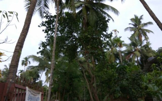 Spot On 48605 Sharang Holiday Homes