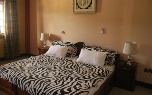 Oguaa Apartments & Lodging