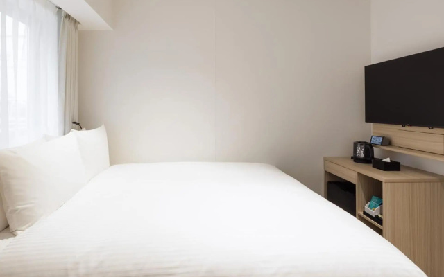 Toranomonholic Hotel – Guest Rooms – Tokyo