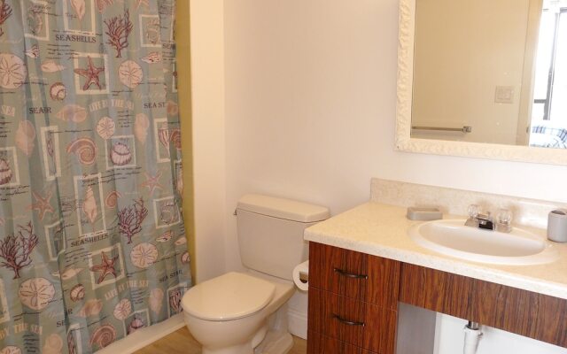 Inviting Beachfront Condo With Large Balcony and Pool