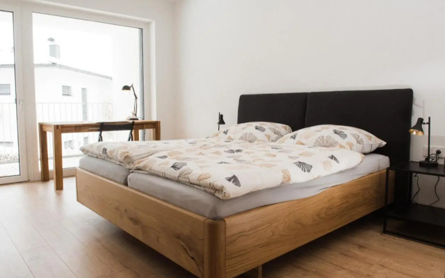 Ferienwohnung Bergsonne mit Sonnenbalkon und Tiefgaragen Parkplatz
