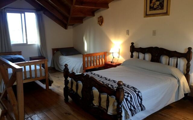 Apart Hotel el Jardin de los Presentes