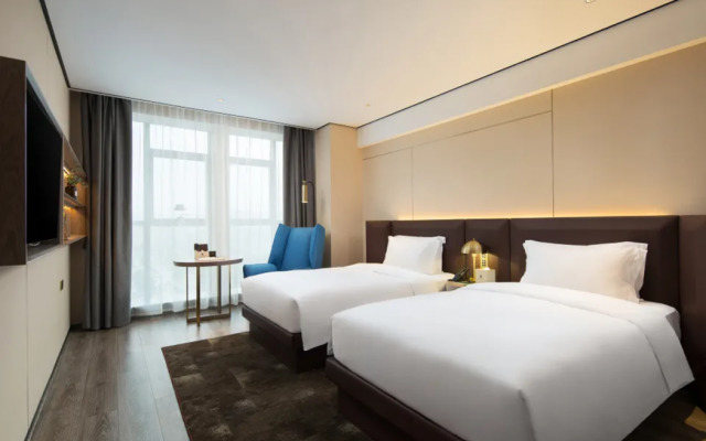 Echarm Plus Hotel (Wuhan Donghu College Dahualing Subway Station)