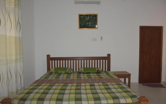 Green White Deluxe Room