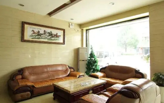 7 xing Ge Business Hotel