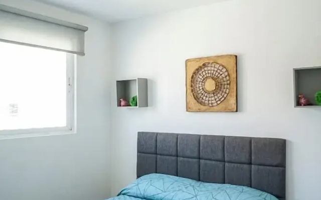 Poliforum Modern 2BR Modern Apartment