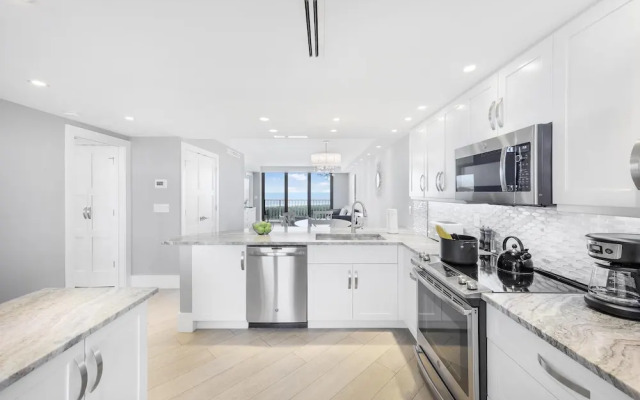 Elegant Beachfront Condo in Private Community