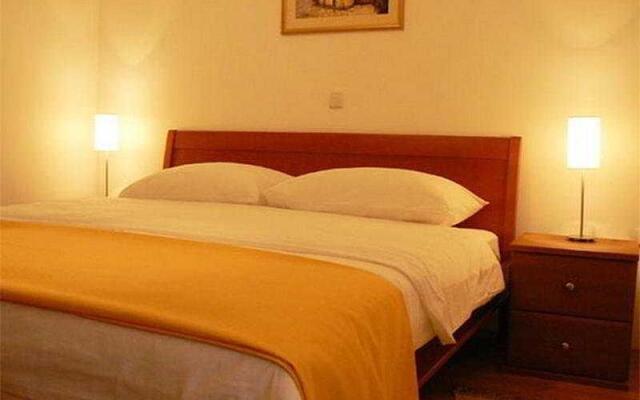 Uspjeh Apartmani