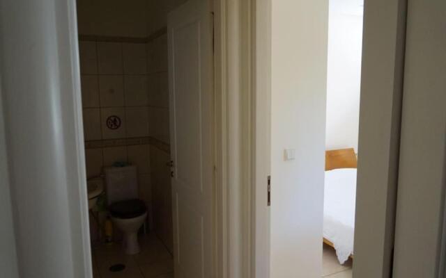 Apartment with a garden, BBQ, swimming pool and jacuzzi