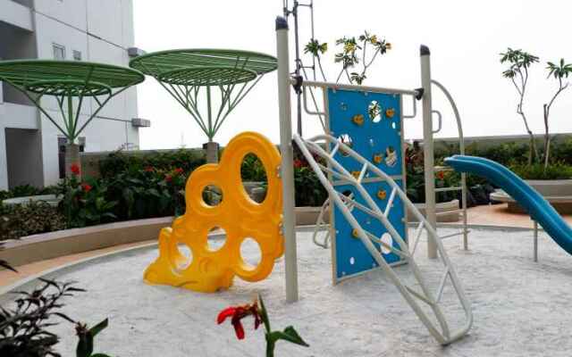 Modern 2BR with City View at Bassura Apartment By Travelio