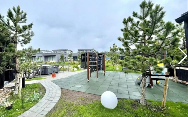 E&K apartamentai su šildomu baseinu kieme