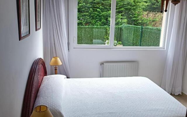 Apartamento con jardin privado junto playa Usil - Mogro