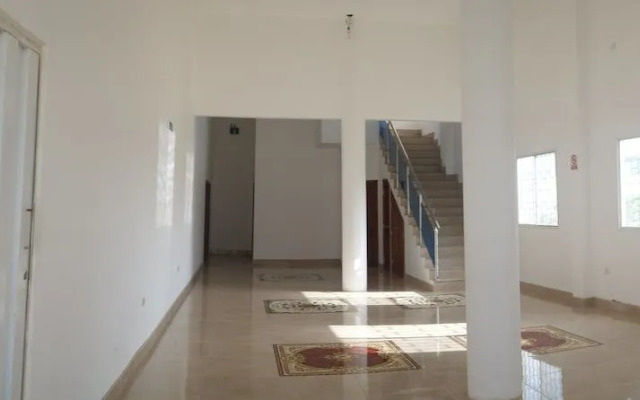 Hostal Palmeras Playa Milina