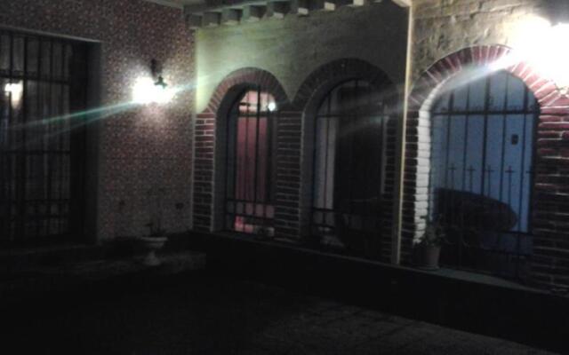 Hostal Latitud 0