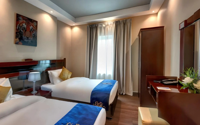 Al Bustan Tower Hotel Suites