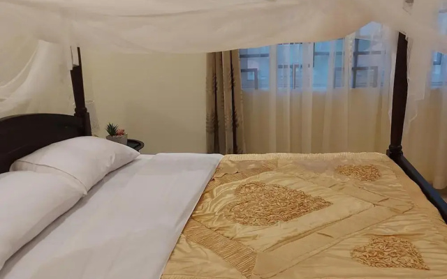 Cozy 2-bed Apartment in Akright City, Bwebajja