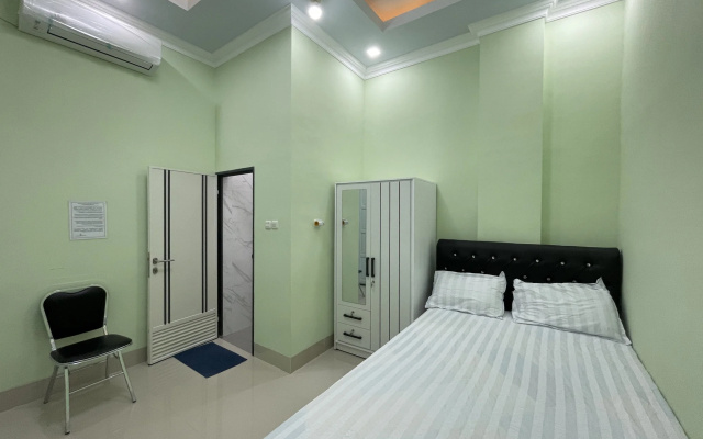 Hotel O Homestay Purirano – Guest Rooms – Kendari