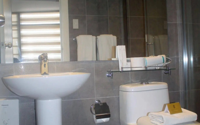 SIGLO SUITES @ The Gramercy Residences