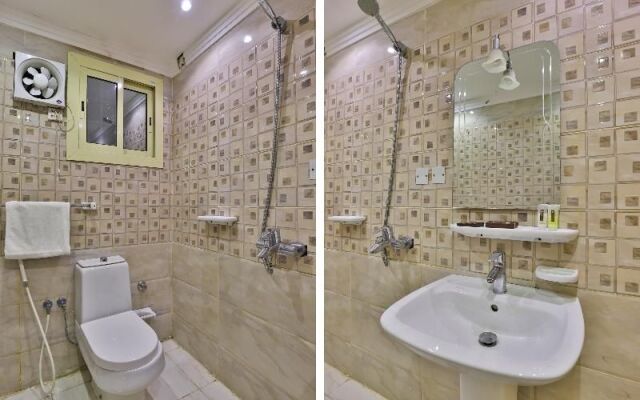OYO 208 Roshan Hotel Suites Hera