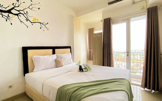Homey And Cozy Living Studio At Poris 88 Apartment
