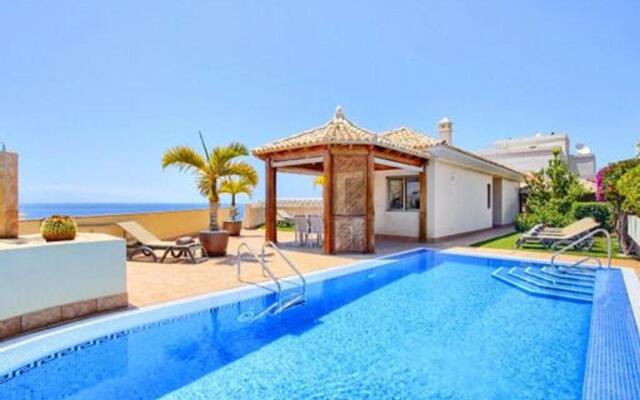 4 bedrooms chalet with sea view private pool and enclosed garden at Santiago del Teide 1 km away from the beach