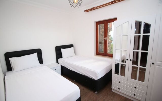 Gumusluk Tramonto Evleri