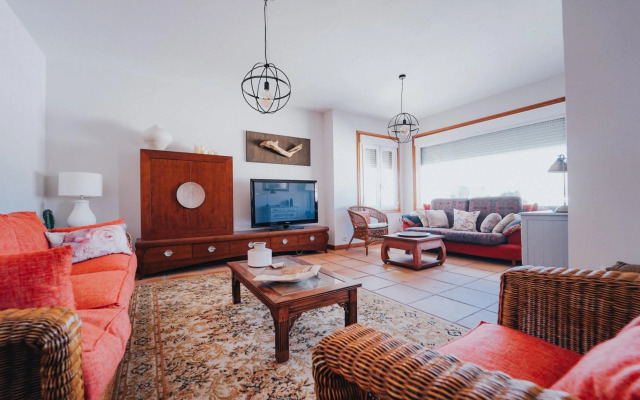 Villa con piscina a pie de playa