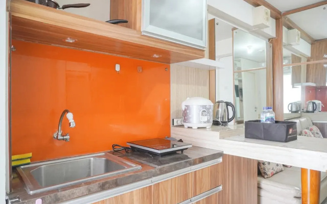 Homey And Strategic 2Br At Bassura City Apartment