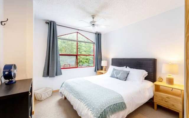 Cozy Creekside Two-Storey Condo