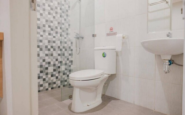 Kost M25 Hostel by Reddoorz
