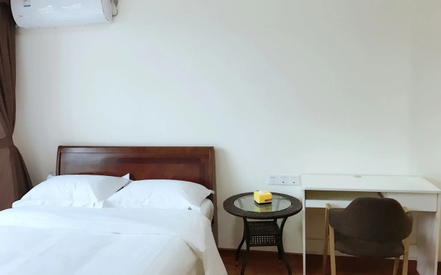 Xingyue Apartment Luogang Wanda