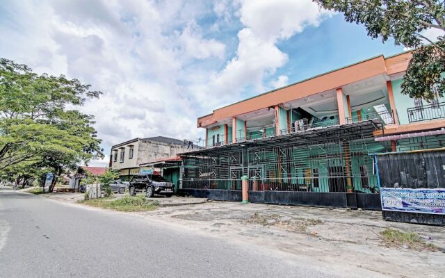 SPOT ON 92716 Penginapan Syafira Near Perumahan Mustamindo Permai 1