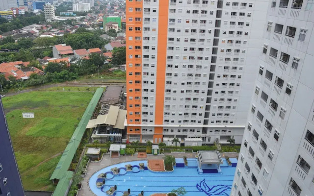 Cozy Style 2BR at Green Pramuka City Apartment