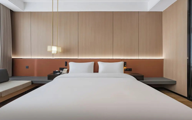 Wanzai Yijia La Maison Hotel