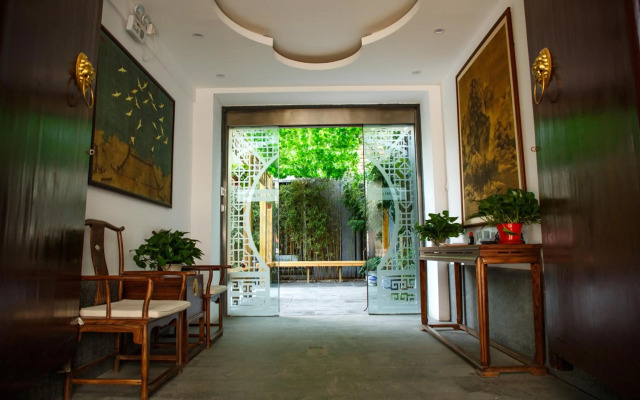 Qiuguo Hutong Courtyard Hotel