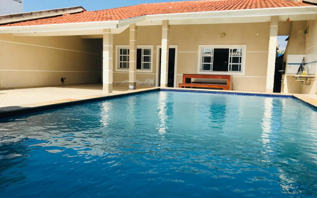 Casa de praia com piscina e churrasqueira - Indaiá Bertioga