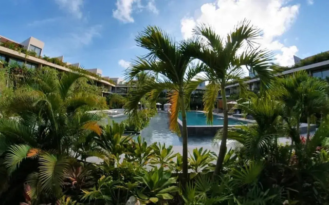 A New Wave of Living 2 Bedroom Condo With Pool View and Garden