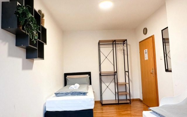 Suiteable Living - Boardinghaus mit Parkplätzen, WLAN und Waschraum