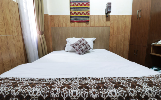 58 Guesthouse Tangerang by ZUZU