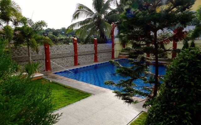 The Executive Villa Inn & Suites