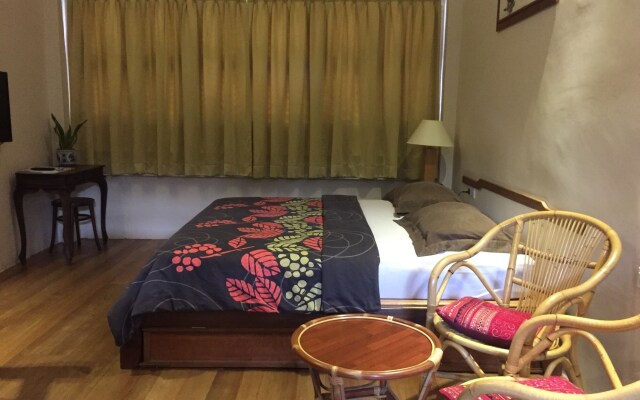 Palm Mansion Boutique Suites by Moxy