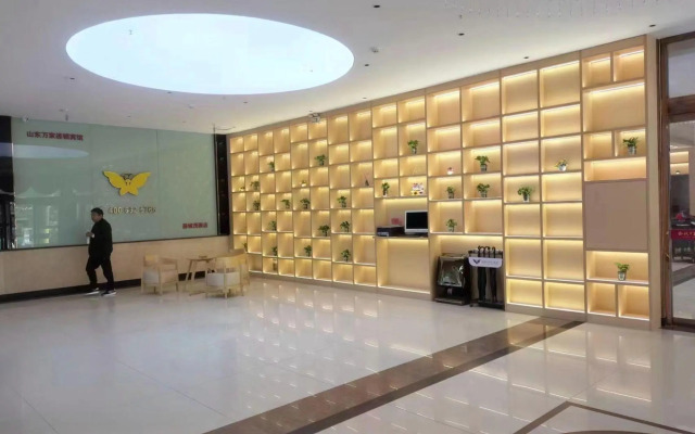 Wanjia Business Hotel (Zaozhuang Maoyuan)
