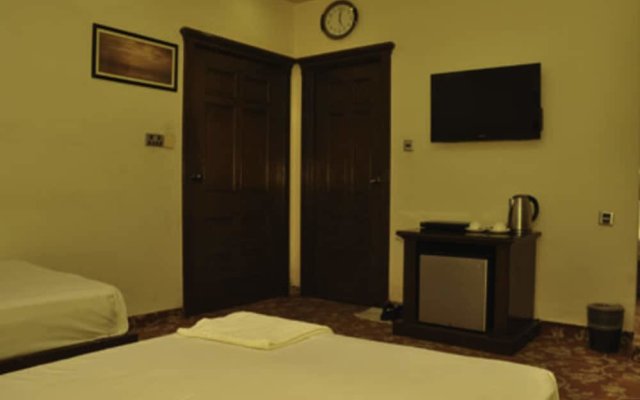 Raj One Hotel