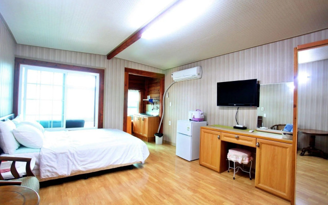 Windmill and Sea Pension