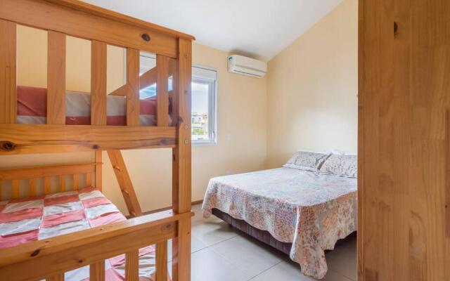 Casa com piscina e ar condicionado em Garopaba