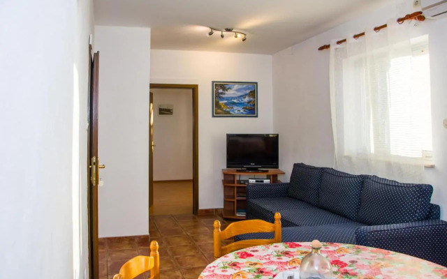 Apartments with a parking space Senj - 11520
