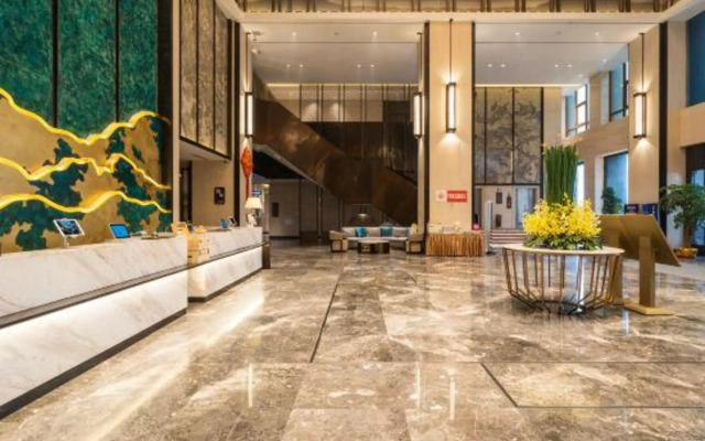 Xinzheng Xingangwanhua Hotel